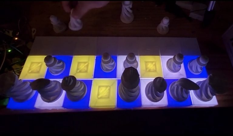 This illuminated chessboard displays possible moves