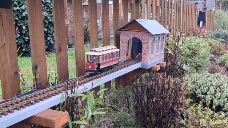 Adorable model trolley livens up a garden