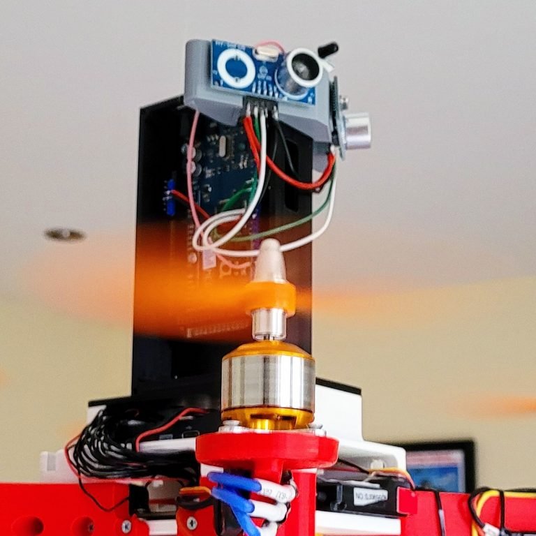 An experimental low-cost ultrasonic drone positioning system