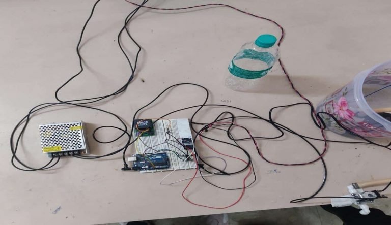 RFID Reader & Arduino-Uno Interfacing Based Automatic Restricted Quantity Water/Petrol Dispenser